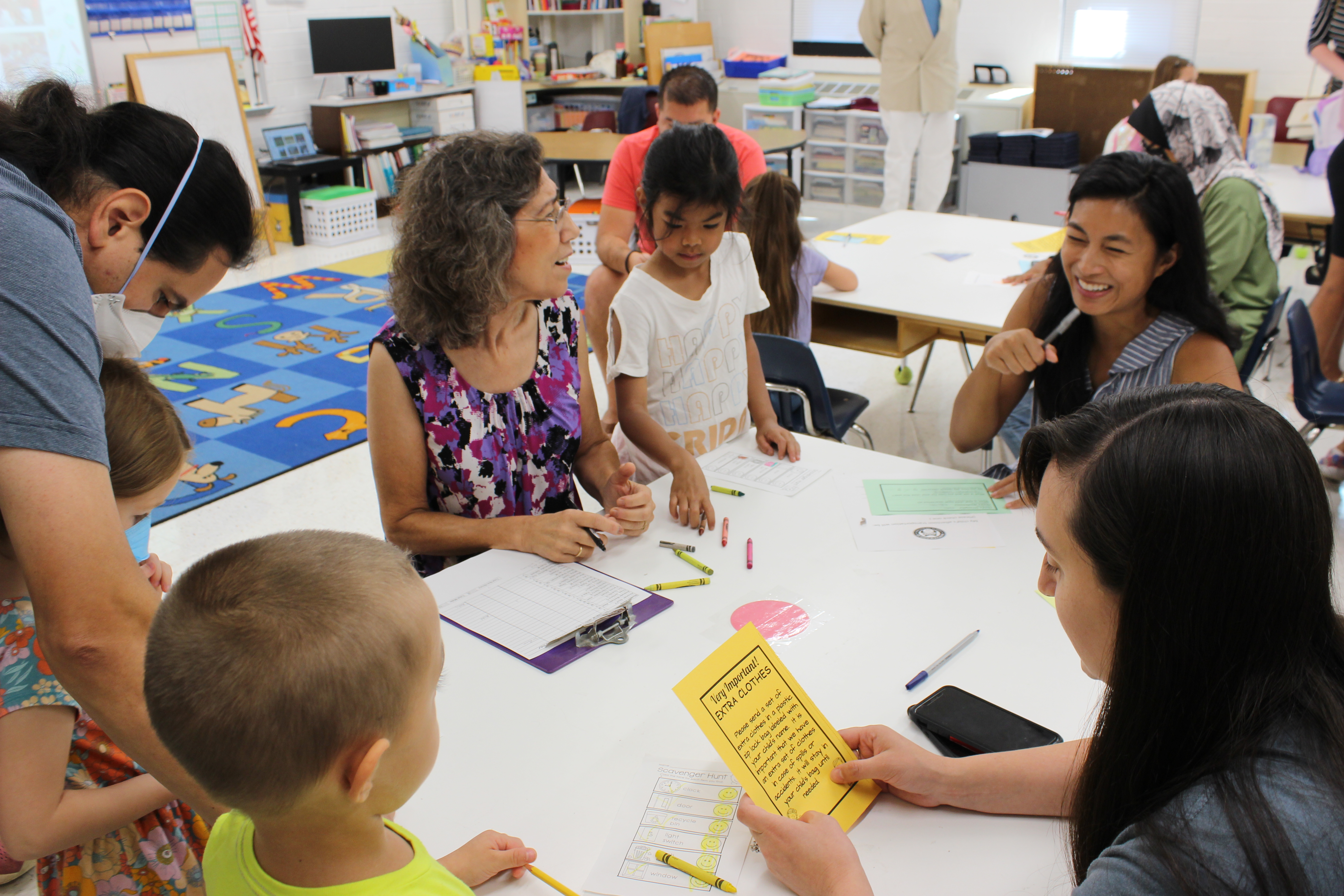 Mrs. Pinkerton with parents at open house