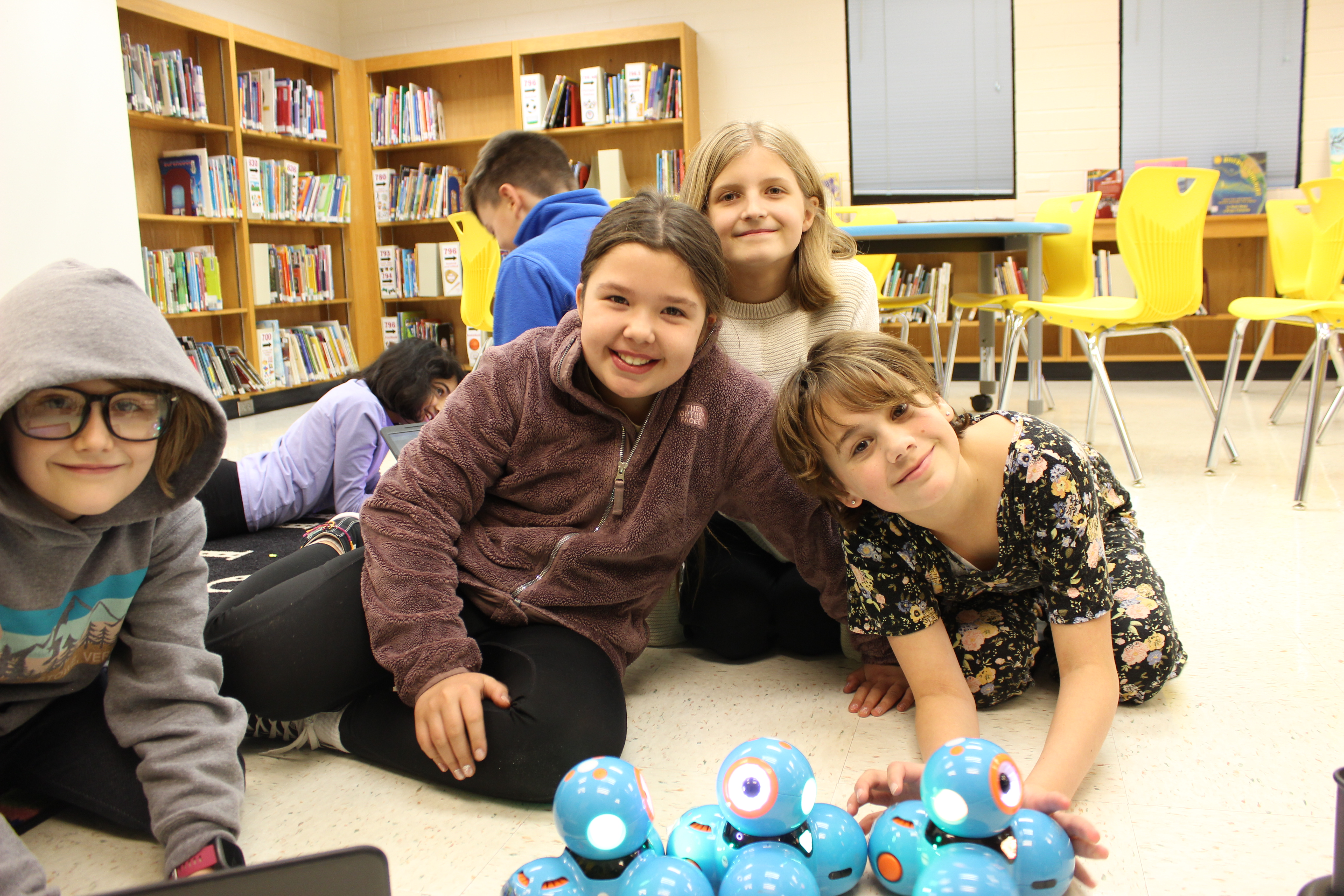 students coding with robots